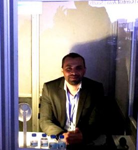 Adel in the interpreter's booth - MENA Mining Show 2016
